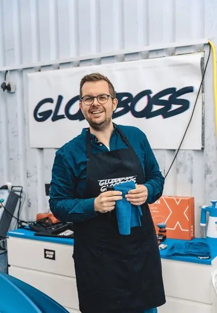 Marvin Mieth in a Glossboss apron in the detailing shop
